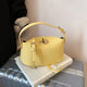 Niche marque femmes mode sac à main doux polyvalent épaule sac de messager 2025 Super chaud jaune Portable sac seau sac pour femmes